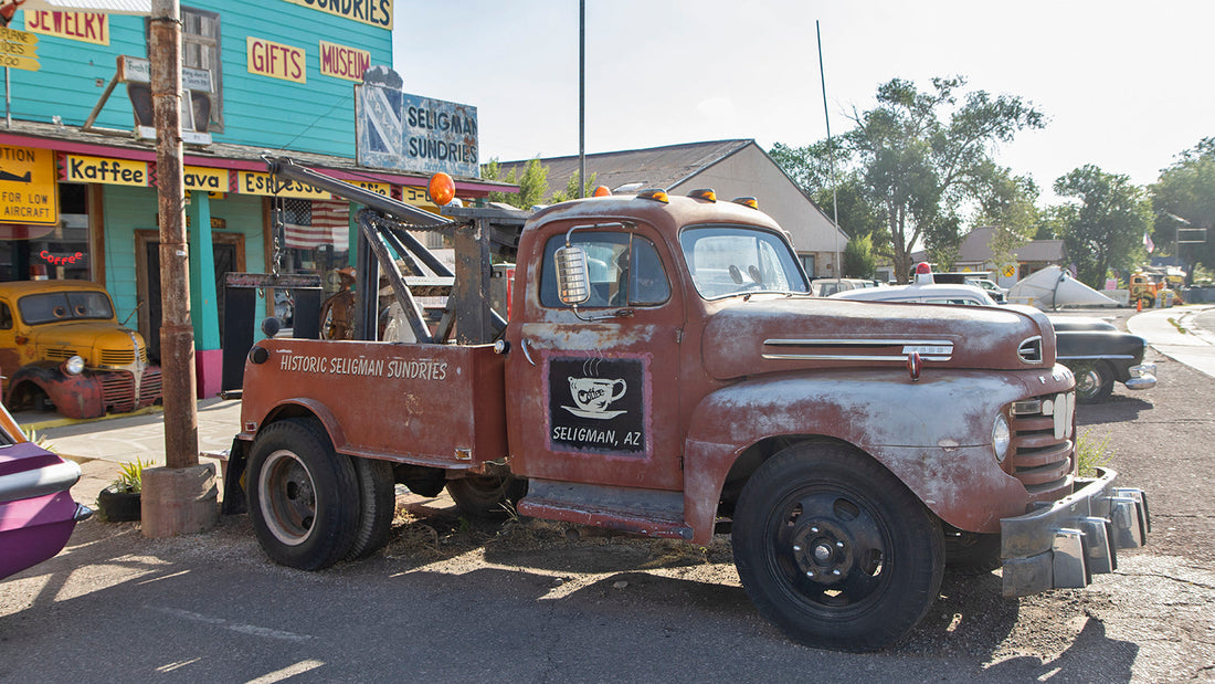 Old Rusty Car in front of a store in Seligman