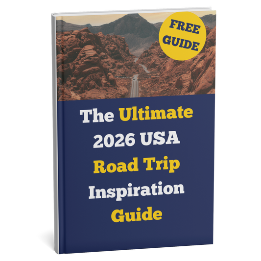 Book cover of 'The Ultimate 2026 USA Road Trip Inspiration Guide' with a scenic road and mountains on the cover.