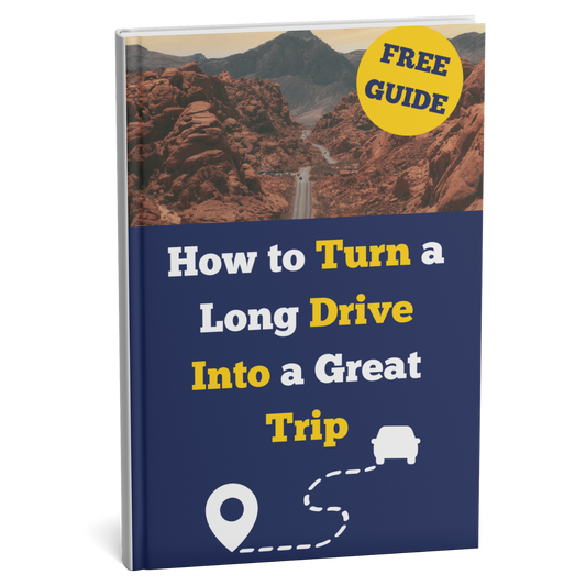 Book cover with mountain landscape and text 'How to Turn a Long Drive Into a Great Trip' on a white background