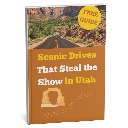 Book cover of 'Scenic Drives That Steal the Show in Utah' with a scenic road and free guide label.